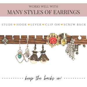 May include: A horizontal wooden earring display bar with notched edges, holding various earrings including turquoise, pearl, and crystal styles. Text reads: WORKS WELL WITH MANY STYLES OF EARRINGS, STUDS, HOOK, LEVER, CLIP ON, SCREW BACK, keep the backs on!