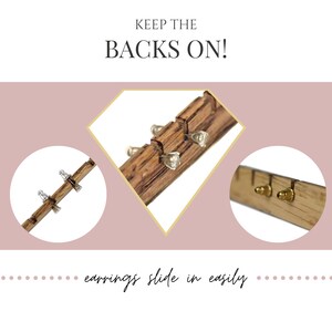 May include: A wooden earring organizer with slots for stud earrings, featuring the text KEEP THE BACKS ON! and earrings slide in easily. The display shows stud earrings with metal backs inserted into the wood, demonstrating how they slide in.