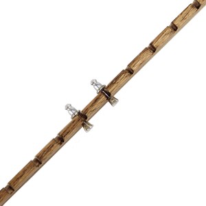 May include: A long, narrow, brown wooden strip featuring a series of evenly spaced notches along its length. Two small, silver-colored metal earring backs are attached to the wooden strip, positioned within two of the carved notches.