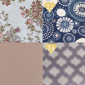 May include: Four fabric swatches with different patterns. The top left swatch has a white background with a floral pattern in shades of pink, green, and brown. The top right swatch has a dark blue background with a white and light blue circular pattern. The bottom left swatch has a solid light brown background. The bottom right swatch has a light gray background with a repeating pattern of dark gray and light gray geometric shapes.