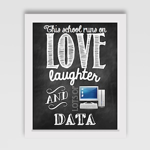 May include: Black and white chalkboard sign with the text "This school runs on LOVE laughter AND LOTS OF DATA" with a computer and keyboard illustration.