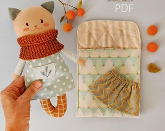 May include: A handmade cat doll with a rust-colored scarf and a light green polka dot dress. The doll is next to a matching bed and shorts, with the text "sewing pattern PDF".