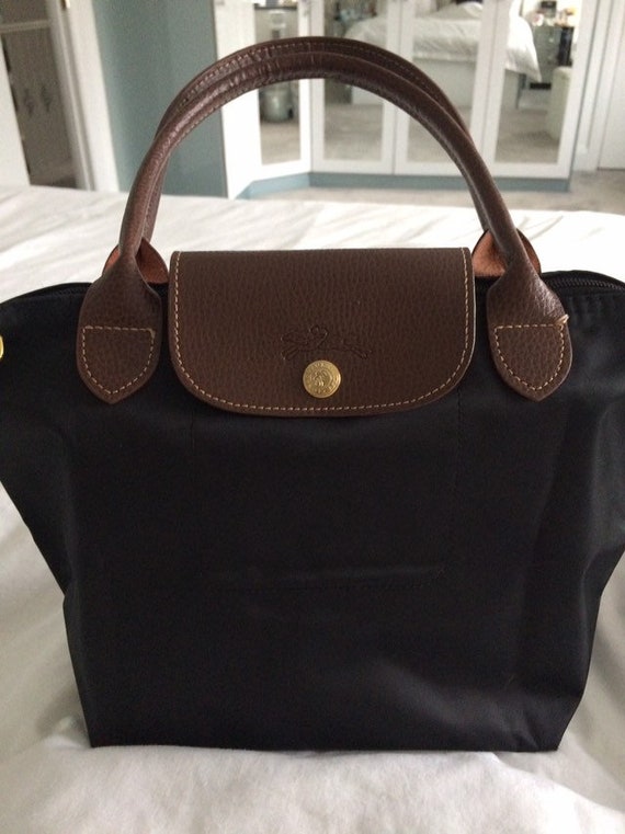 folding longchamp bag