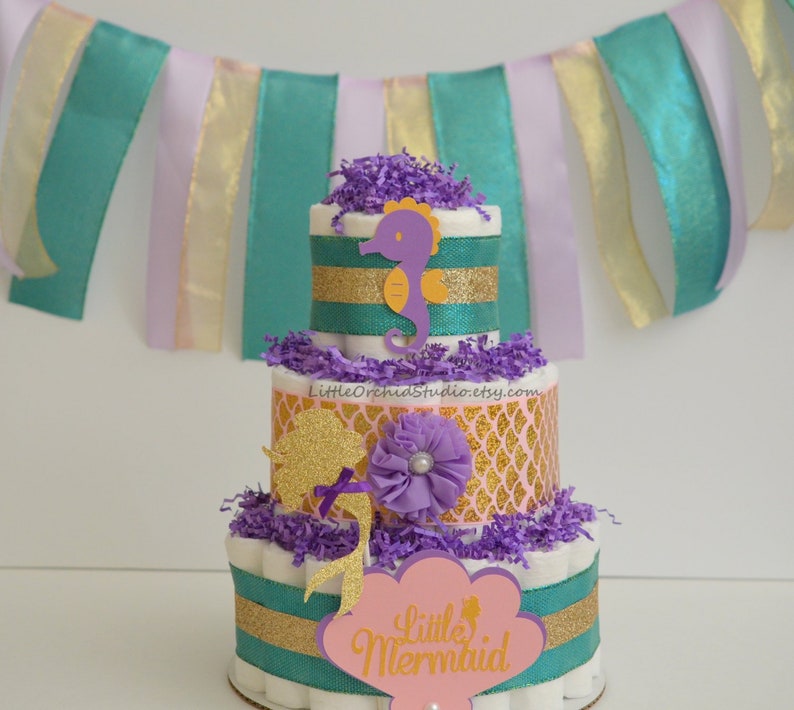 purple and pink baby shower gifts Girl Little Mermaid Baby Shower Mermaid Diaper Cake Mermaid baby shower unique diaper cakes Teal
