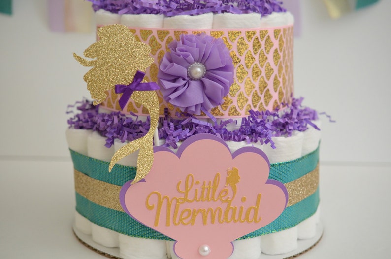 purple and pink baby shower gifts Girl Little Mermaid Baby Shower Mermaid Diaper Cake Mermaid baby shower unique diaper cakes Teal