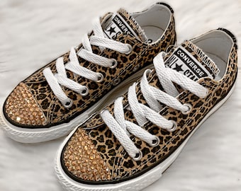 red converse with cheetah tongue