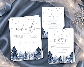 May include: A wedding invitation suite featuring white cardstock with navy blue watercolor pine trees at the bottom and silver snowflake accents. The text includes "we do," "Chelsea and Noah," and "kindly RSVP" with event details.