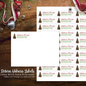 May include: A sheet of free return address labels with a Christmas tree design. The labels feature the text "Hopkins Family" and an address. The text "Free Return Address Labels Included With Your Purchase" is printed at the bottom of the sheet.