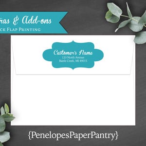 May include: A white envelope with a turquoise blue label that says "Customer's Name" with an address below. The text "Extras & Add-ons Back Flap Printing" is at the top of the envelope. The text "{PenelopesPaperPantry}" is at the bottom of the envelope.