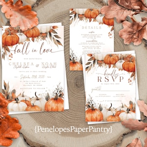 May include: A set of fall-themed wedding stationery featuring orange and white pumpkins, fall foliage, and the words "fall in love." The invitation includes the names Chelsea and Noah, and the RSVP card is also included.