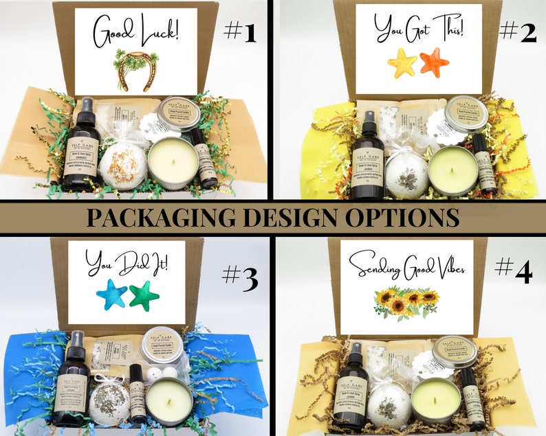 May include: Four gift box packaging options for a self-care gift set. Each box has a different colored tissue paper and a card with a different message. The messages are "Good Luck!" with a horseshoe, "You Got This!" with two stars, "You Did It!" with two stars, and "Sending Good Vibes" with sunflowers. Each box contains a bath bomb, a candle, a bottle of body spray, and a small bottle of essential oil.