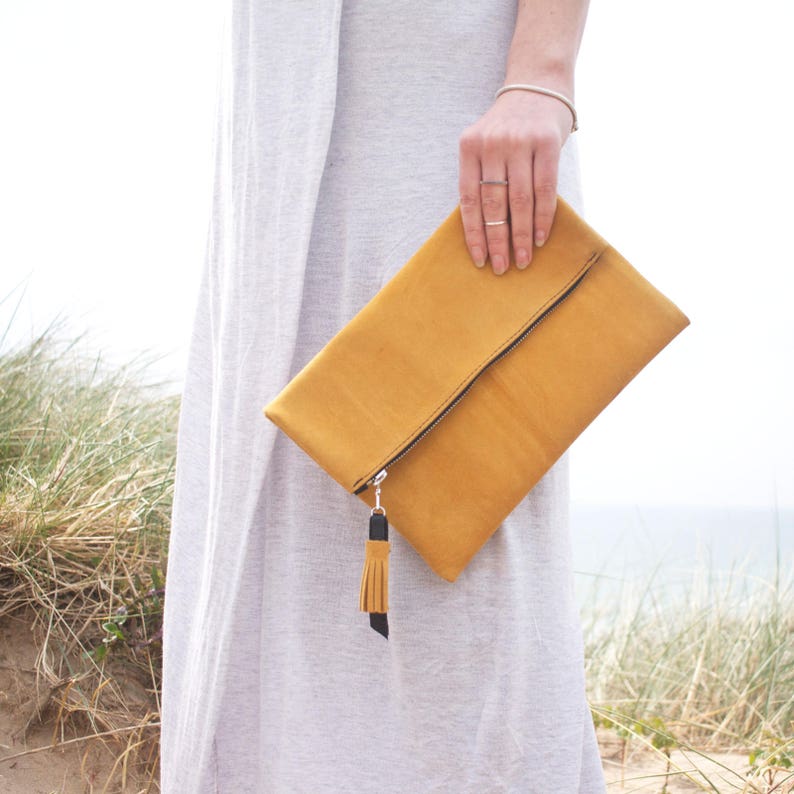 yellow suede clutch bag
