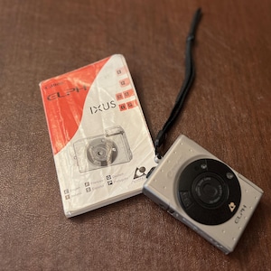 Canon ELPH IXUS Camera IX240 and Manual With New Battery-Working Condition
