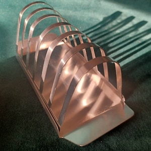 Brushed stainless steel 6 slice toast rack unused vintage