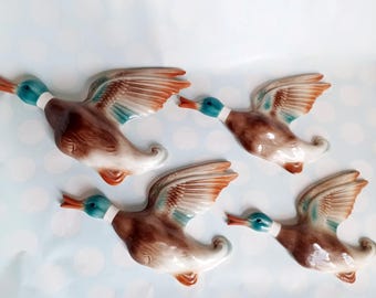 Graduated vintage flying ducks set of four
