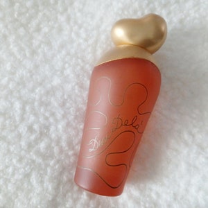 vintage empty fragrance bottle Deci Dela by Nina Ricci