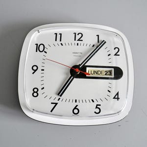 Vintage wall clock VEDETTE transistor made in France, perpetual calendar, rare model 70s