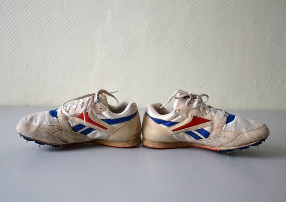 reebok spikes running shoes