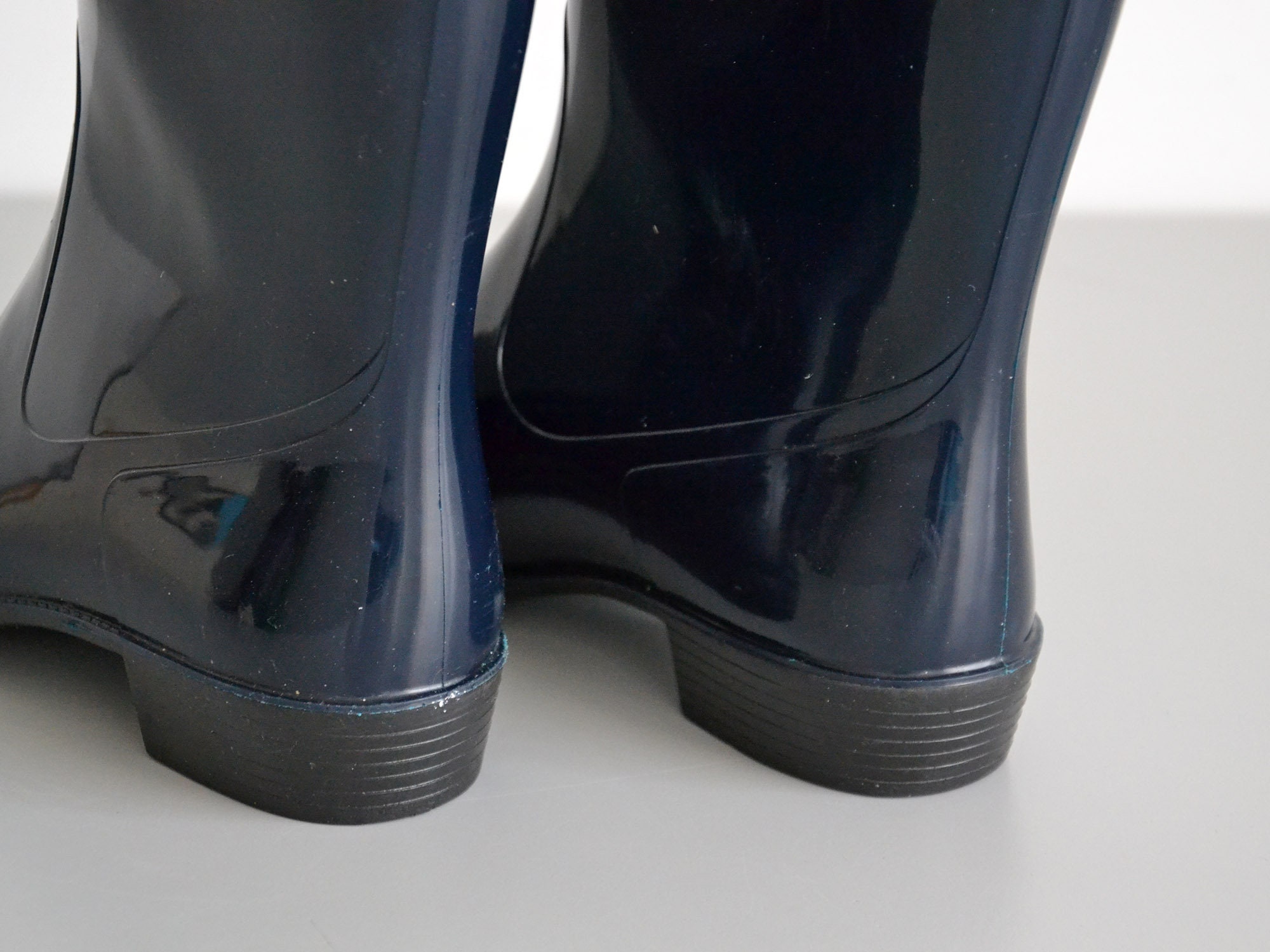 short black rubber boots