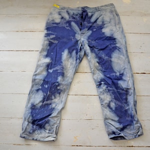 Discolored and stained indigo color vintage work pants, unique collection &quot;l&#39;effet&quot; by Ephemere Intemporel
