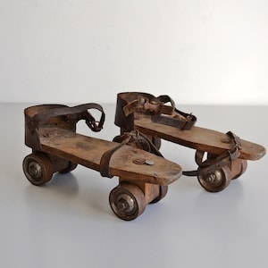 Old wooden roller skates, sports decoration, 1930s shoe collection
