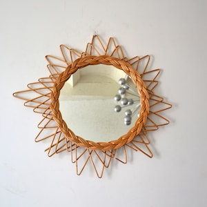 Vintage star-shaped rattan mirror
