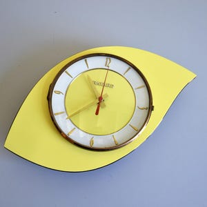 Vintage wall clock in Formica BAYARD, French yellow mid century clock