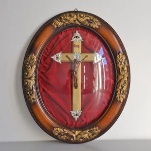 Religious reliquary frame with crucifix, convex glass 1900, vintage devotional wall decoration