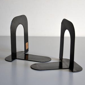 Pair of vintage black metal bookends, Printemps Paris store, 1940s-50s