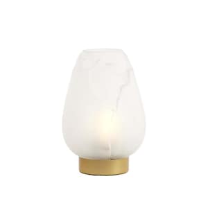 May include: A white, teardrop-shaped table lamp with a gold-colored base. The lamp has a frosted glass shade with a marbled pattern. The lamp is lit from within, creating a soft glow. The lamp is a decorative lighting fixture.