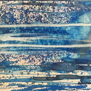 May include: Abstract watercolor painting with horizontal blue, white, and gray stripes. The background is a light beige color with blue and gray splatters.