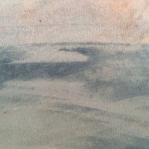May include: A close-up of a canvas painting depicting a seascape with a light blue sky and a dark blue ocean. The ocean is painted with brushstrokes that create a sense of movement.