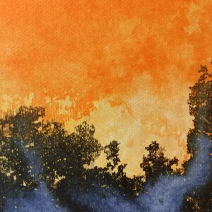 May include: Watercolor painting of a sunset with orange, yellow, and blue hues. The sky is filled with clouds and the silhouette of trees is visible in the foreground.