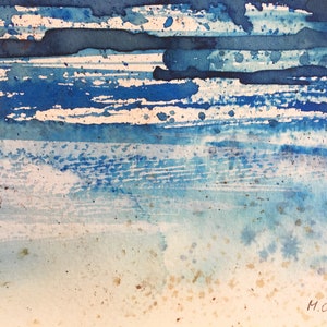 May include: Abstract watercolor painting with blue and white stripes and splatter paint. The painting has a light brown background with the artist's signature "M.ORS" in the bottom right corner.