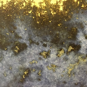 May include: Abstract watercolor painting with a dark blue and black background and gold accents.