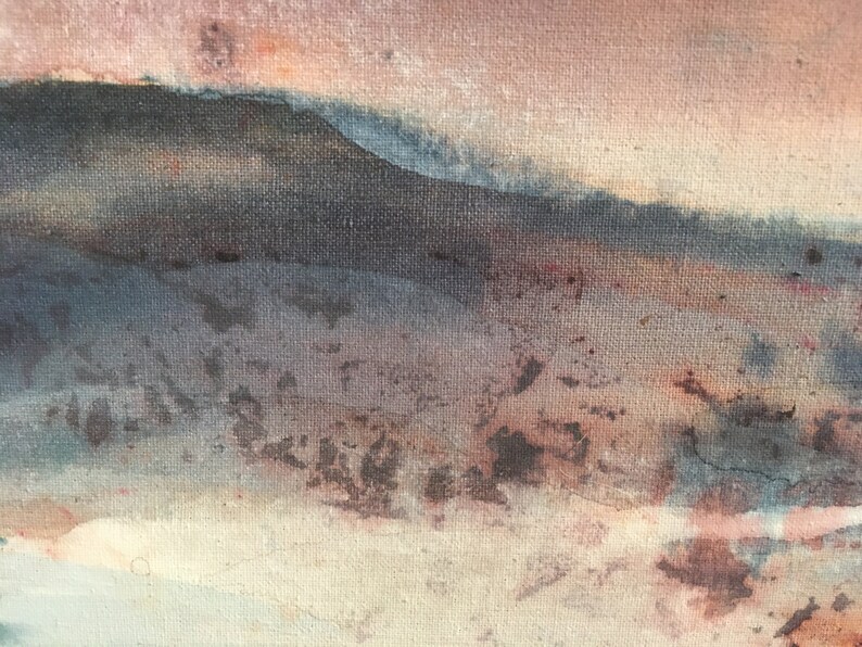 May include: Abstract painting with a textured canvas. The painting features a landscape with a mountain range in the background and a field in the foreground. The colors are muted and earthy, with shades of brown, gray, and blue.
