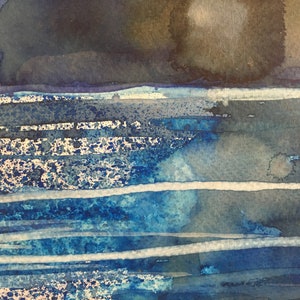 May include: Abstract watercolor painting with a dark blue and gray background and white lines. The painting has a textured look with splatters of paint.