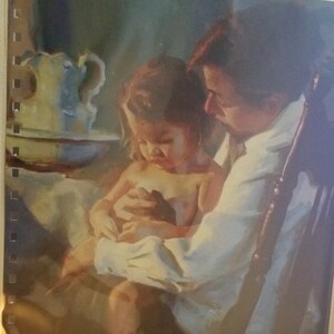 May include: A painting of a man and a young child. The man is wearing a white shirt and is holding the child in his lap. The child is looking down at something in the man's hands. The painting is done in a realistic style and has a warm, inviting feel.