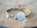 Liberty print bracelet "Thank You Nanny" + customizable name - gift for nanny, babysitter, or teaching assistant - thank you for helping me grow product logo