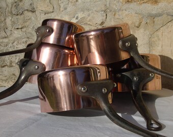 Michel Lejeume, Asnieres Sur Seine, set of 5 copper pans, 3mm thick. Stainless steel lined. In fabulous condition. Appear to be unused.