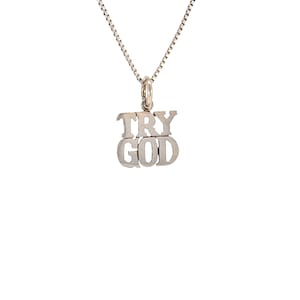 May include: Silver necklace with a pendant that says "TRY GOD" in a bold, blocky font.
