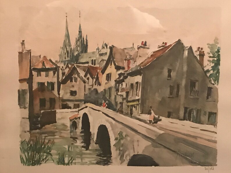 May include: A watercolor painting of a European town with a bridge over a river. The buildings are in shades of brown and gray, and the sky is a light blue. There are trees in the background, and a church with two tall spires is visible in the distance.