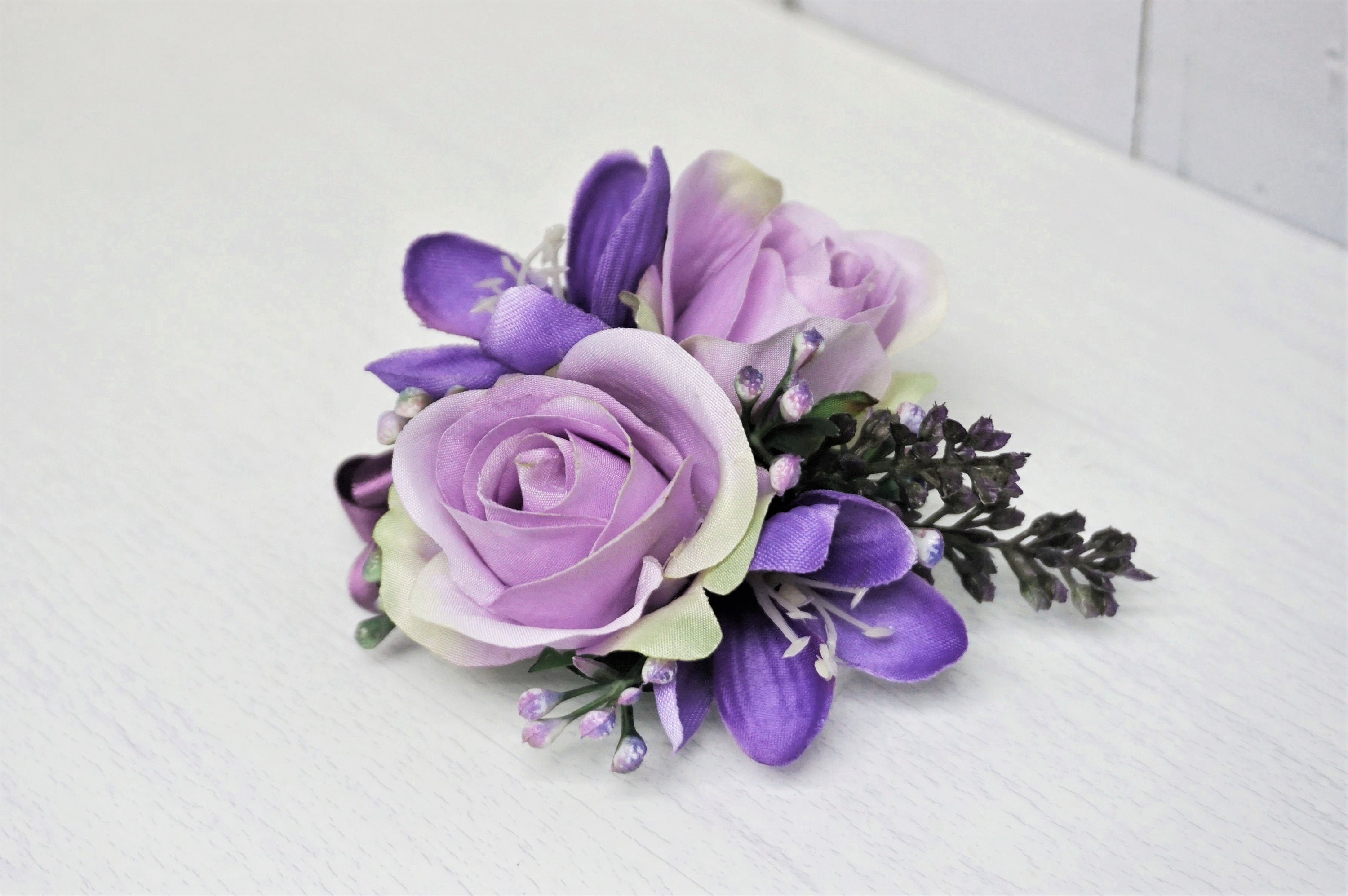 Lavender and Silver wrist corsage and magnet boutonniere in Pratt, KS