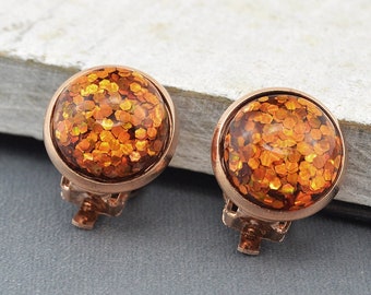 Rose gold ear clips "Glitter-Orange" clips with cabochons