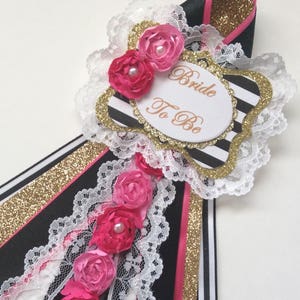 Bride to be corsage/Bride to be pin/Kate Spade Inspired bridal shower corsage/Black striped and gold corsage with hot pink accents