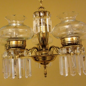 Vintage Lights 1950s colonial mid century crystal chandelier. Cut glass shades