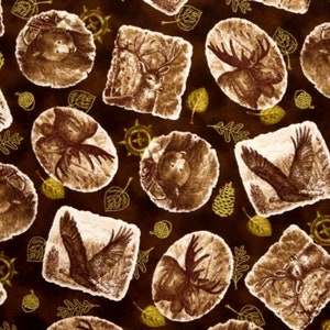 Quilting Treasures Fabrics called Into the Woods pictures of Woodland animals in browns  BTY