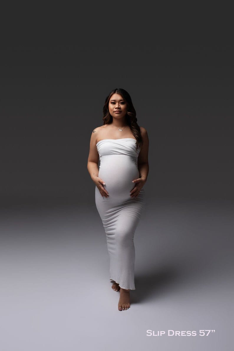 Karina is the boho lace maternity dress of your dreams. With a sheer bust and chiffon skirt, this maternity gown is a beautiful option for your maternity shoot or special event. Crochet lace and long sleeves add interest to the gorgeous look.