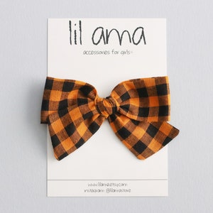 Orange & Black Halloween Hair Bow: Plaid Gingham Baby Girl Headband or Clip image 1