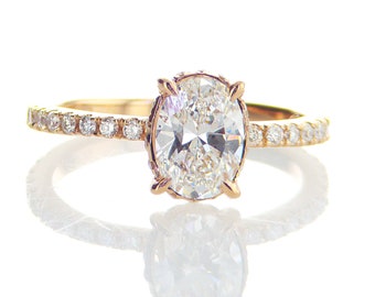 Beautiful 2.10 ctw Oval Cut Diamond Ring with a 1.6 Oval Cut E Color/SI1 Clarity Enhanced Center Diamond